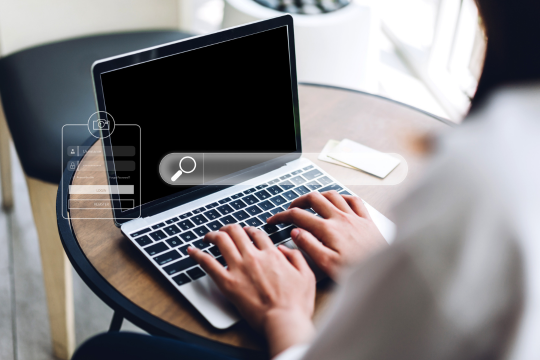 Woman looking for a job at the laptop