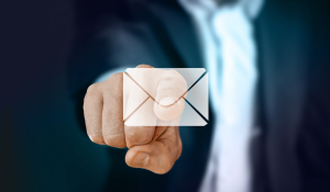 Man touching on a email icon