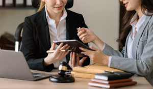 Two female legal advisors in the office